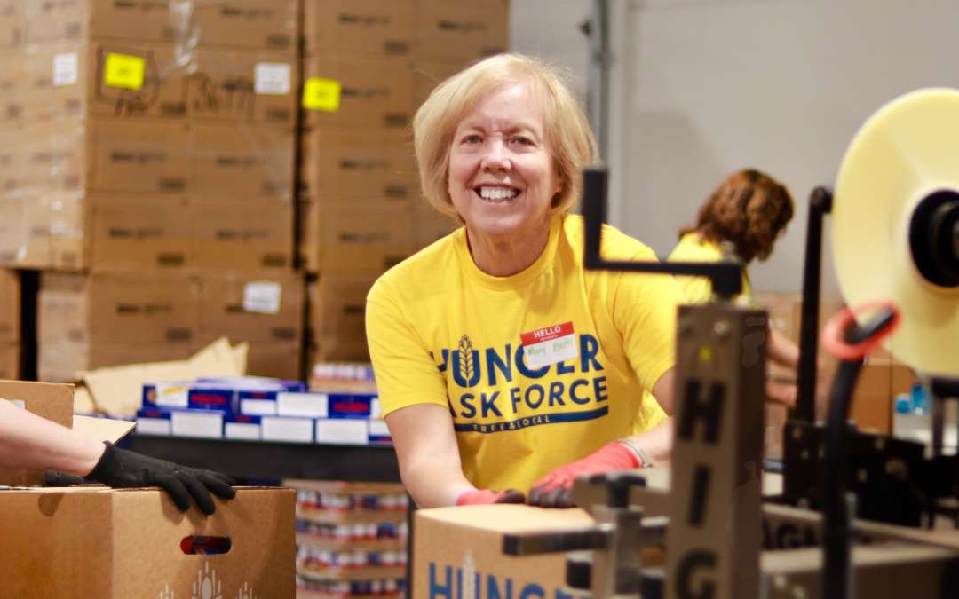 Triple Impact: Hunger Task Force Volunteers Donate Time, Food and Funds for Holiday Food Drive